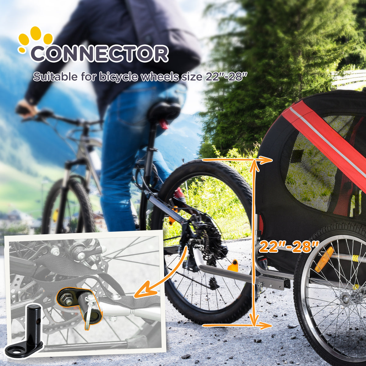 Cyclist towing the dog bike trailer on a mountain road, with a close-up of the wheel hitch