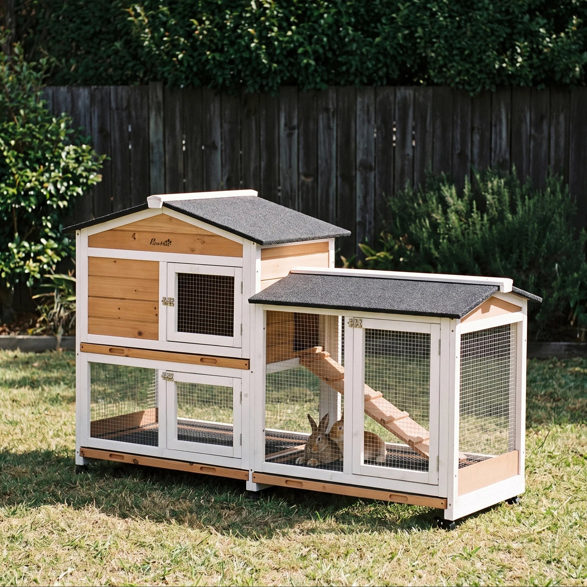 Mobile wooden rabbit hutch on wheels with run and ramp on backyard grass - wrenwood hero