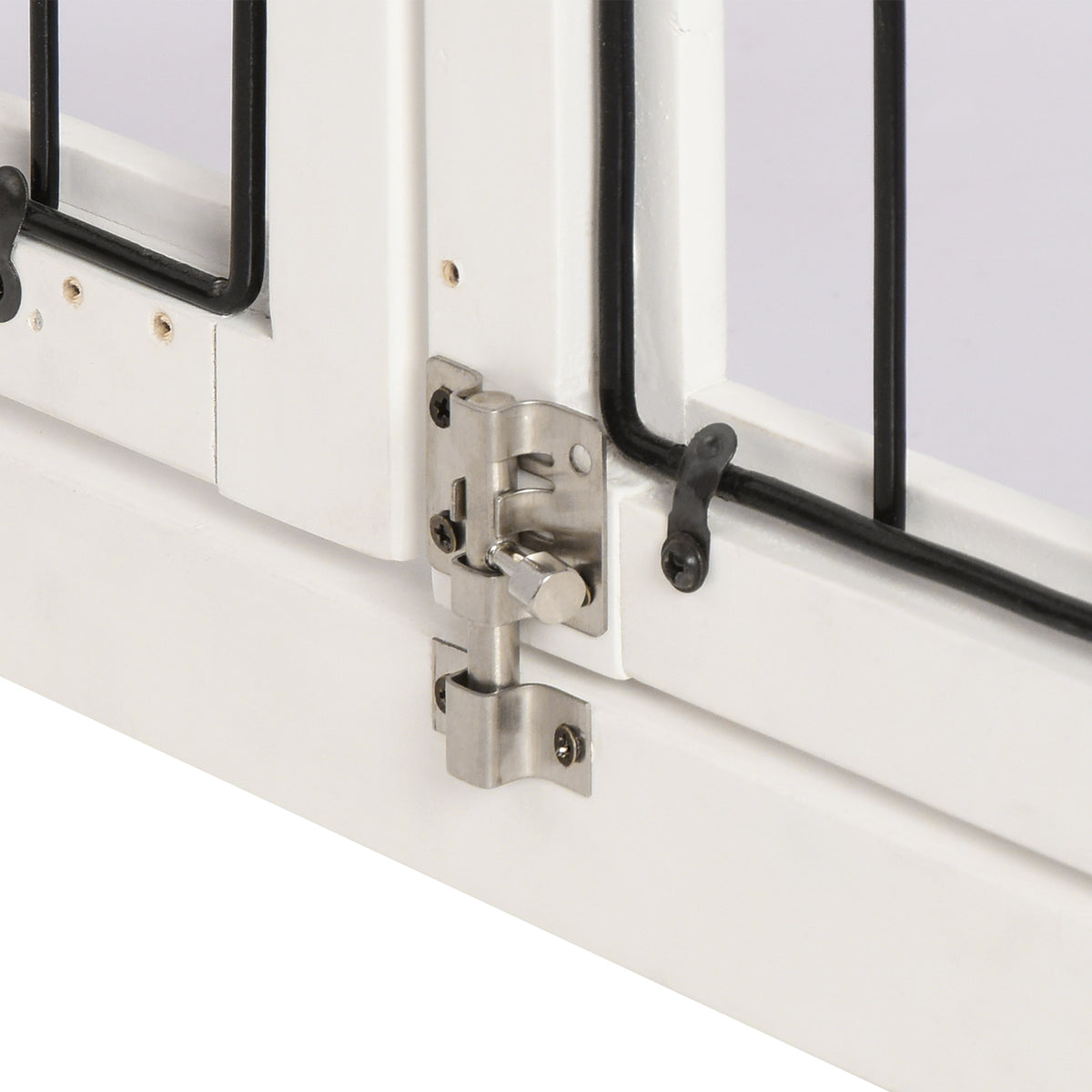 Close-up of the white crate end table's metal door latch and bolt
