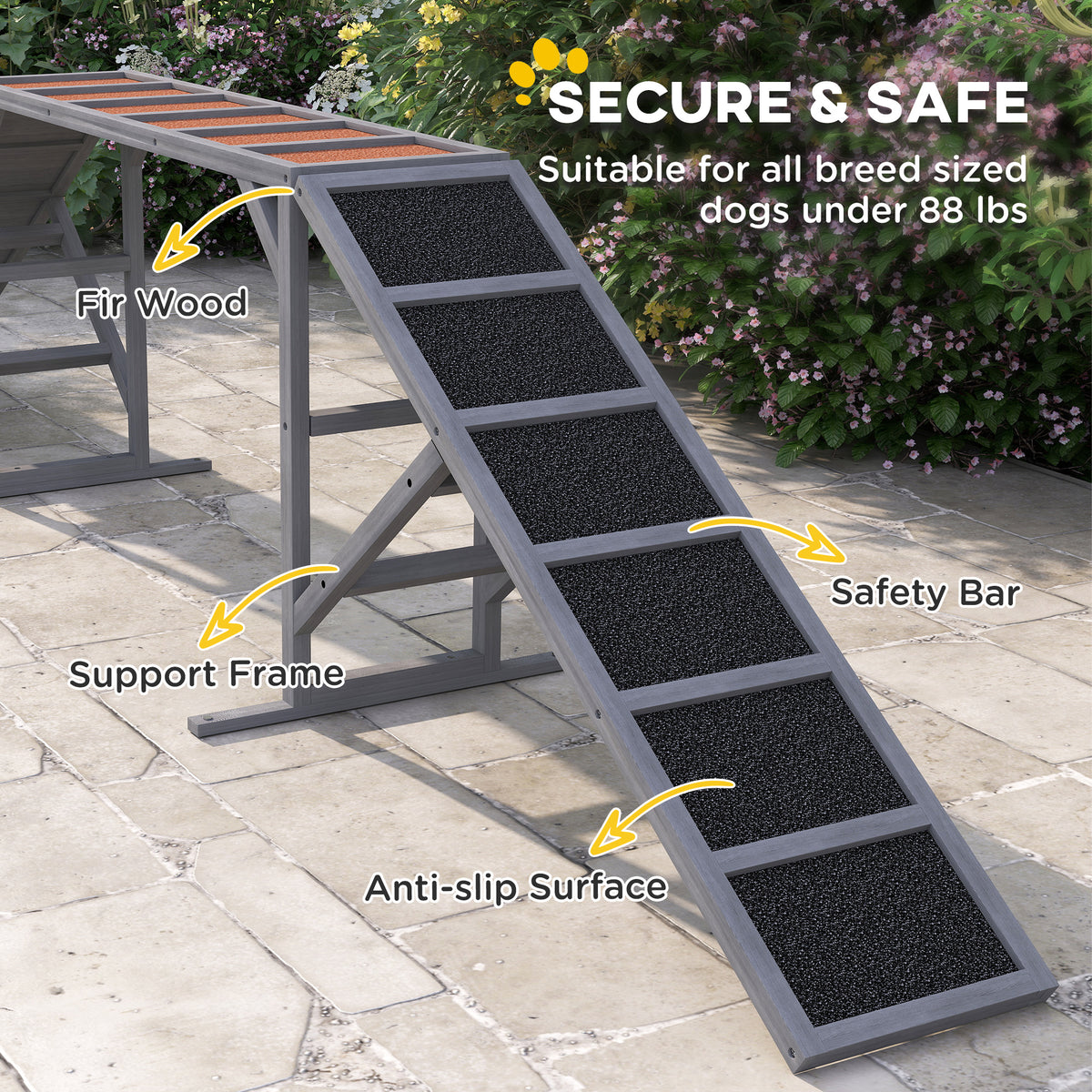 Gray fir wood dog agility ramp on a patio, with its support frame, safety bar and anti-slip surface marked