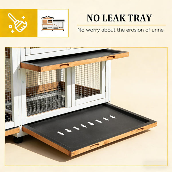 White and natural wood rabbit hutch with its black leak-proof tray pulled out