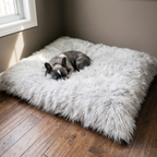 Thick plush warm pet mat on a hardwood floor with a small dog resting on it - wrenwood hero