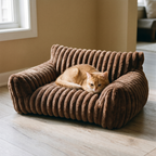 Brown corduroy plush pet sofa bed in a living room with a cat resting on it - wrenwood hero