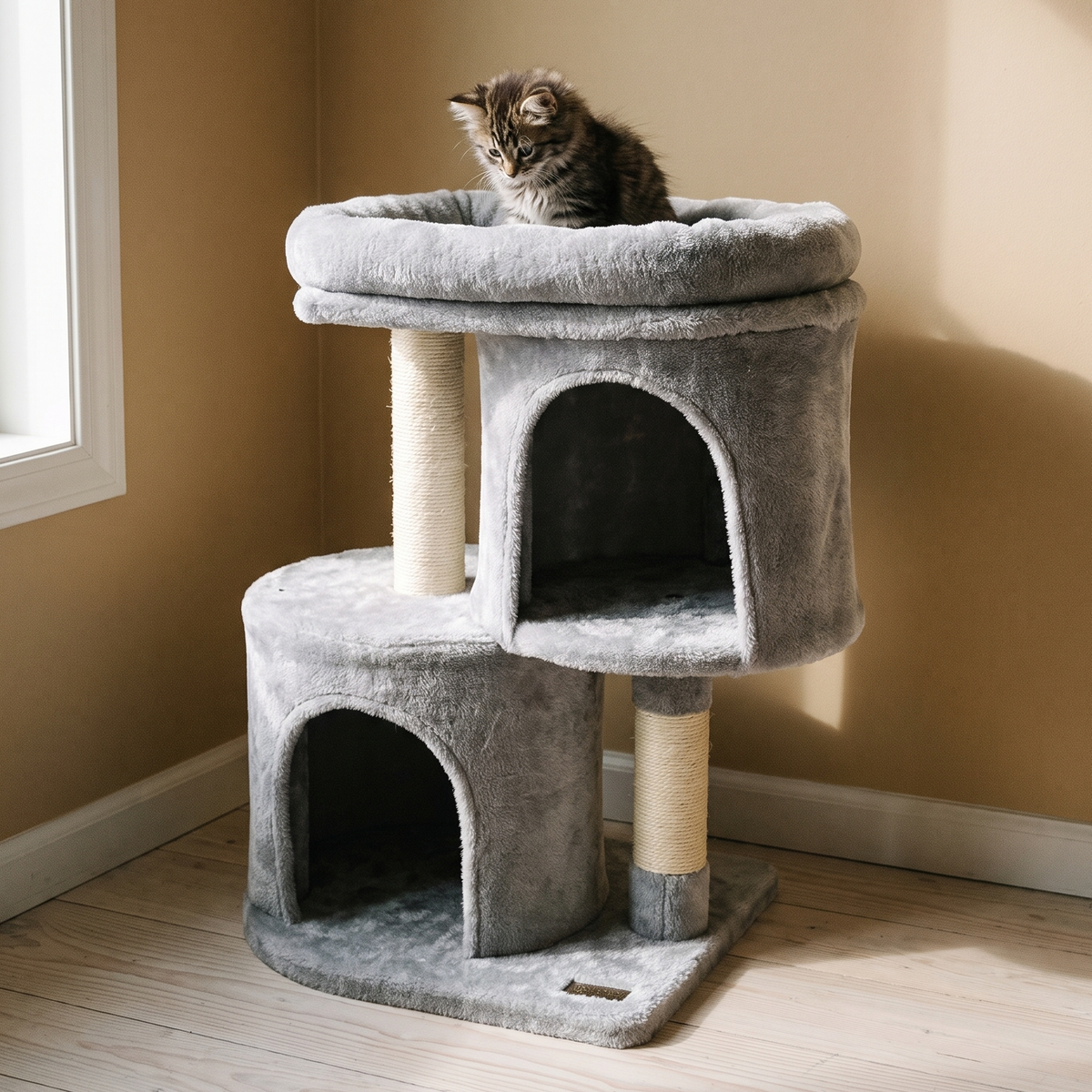 Compact gray cat tree with two condos and sisal posts in a bedroom corner - wrenwood hero
