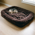 Giant brown plush human-size dog bed lounger in a living room with a small dog asleep on it - wrenwood hero
