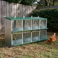 Galvanized metal 8-compartment chicken nesting box in a backyard run - wrenwood hero