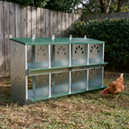 Galvanized metal 8-compartment chicken nesting box in a backyard run - wrenwood hero