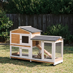 Mobile wooden rabbit hutch on wheels with run and ramp on backyard grass - wrenwood hero