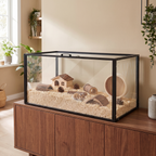Clear acrylic open-top hamster habitat on a walnut cabinet with a hamster inside - wrenwood hero