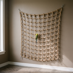 Hemp rope parrot climbing net on a wall with a budgie climbing - wrenwood hero