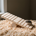 Wooden hamster seesaw toy with a dwarf hamster on the plank - wrenwood hero