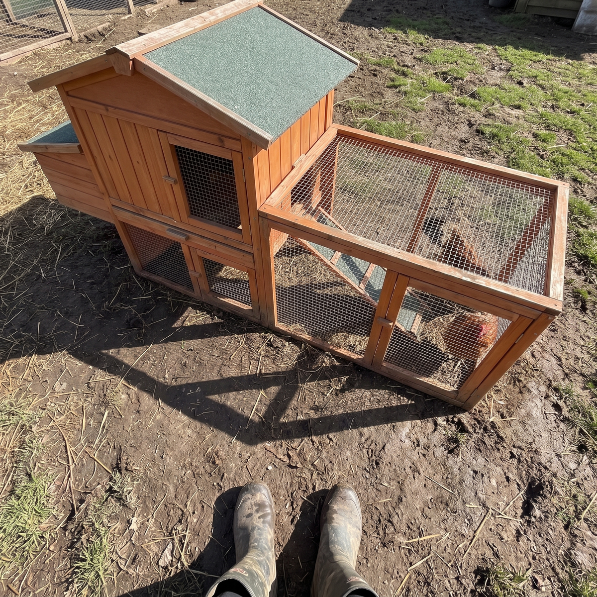 keeper's boots by the wooden chicken coop run - wrenwood ugc lifestyle v2