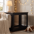 Black wooden dog crate end table in a warm living room with subtle string lights and a cavalier king charles spaniel - wrenwood hero v2