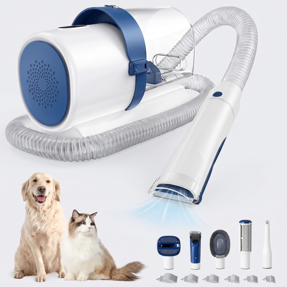Grooming vacuum and attachment heads on white, with a dog and cat beside them.
