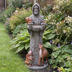 Chickadees at the St. Francis statue bird feeder among a cottage garden flower bed - wrenwood ugc lifestyle v3