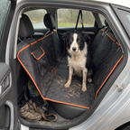 Muddy border collie sitting on the waterproof car seat cover after a rainy hike - wrenwood ugc lifestyle v3